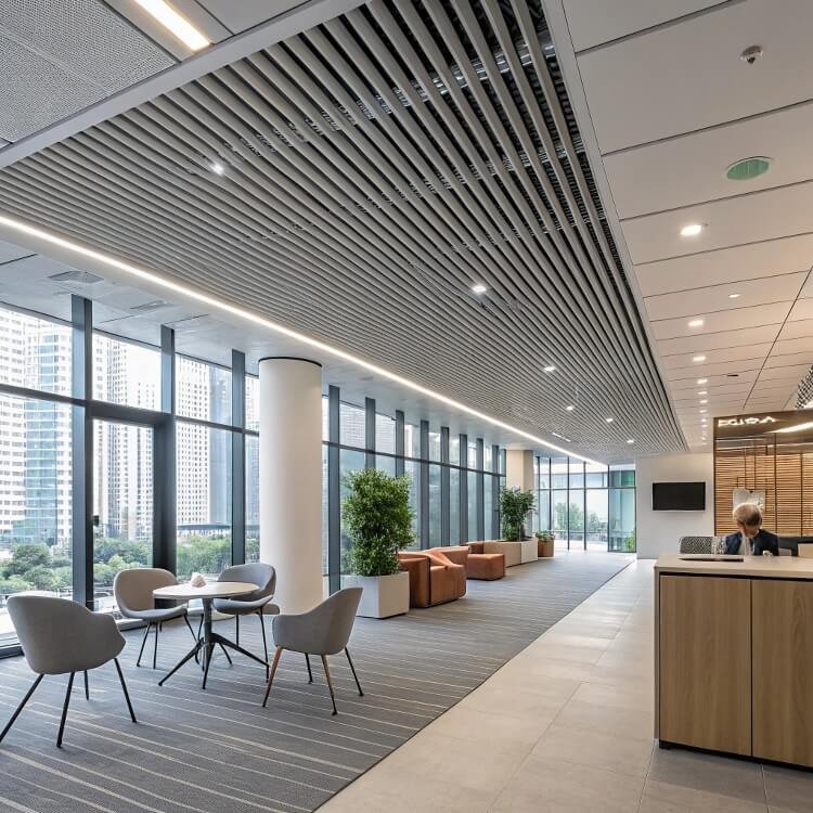 modern office lobby with glass walls and furniture